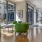 a room with green chairs and a table