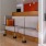 a room with a couch and tables