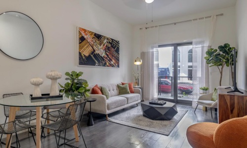 Gorgeous living areas to entertain and enjoy Luxury Apartment Living | a living room with a couch and chairs