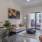 Luxury Apartment Living | a living room with a couch and chairs
