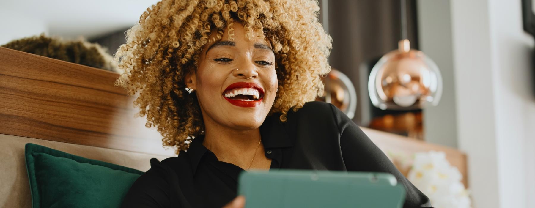a woman holding a tablet