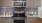 a kitchen with a microwave oven and cabinets
