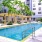 a swimming pool in front of a building