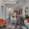 a living room with a tv and couches