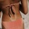 a person wearing a swimsuit at the beach