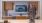 a kitchen with a large television